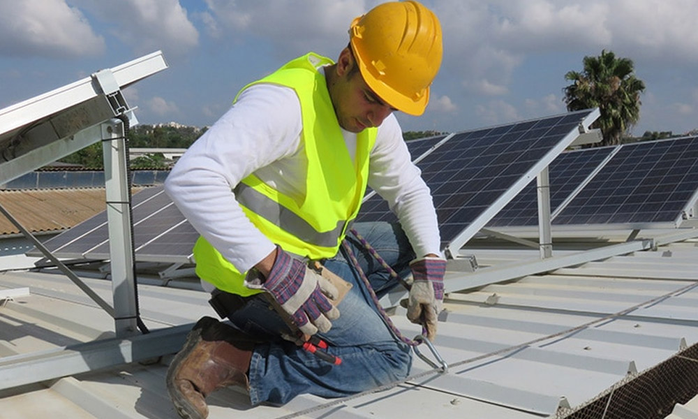 Worker Repairing Commercial Roof in Goose Creek, SC