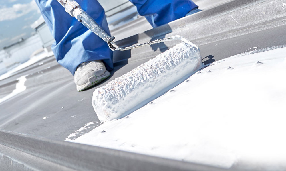 Worker Applying Roof Coating in Moncks Corner, SC